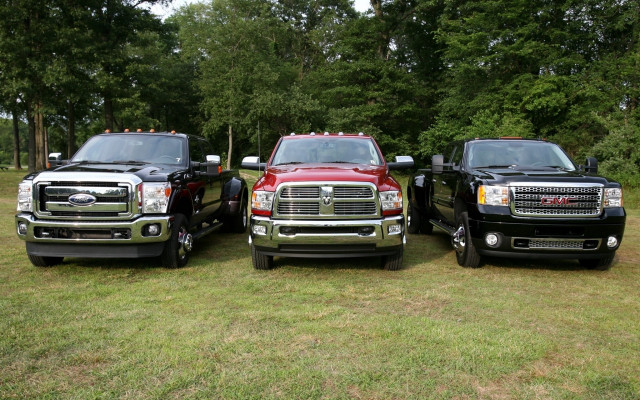 Three trucks field trees grass free wallpaper - medium preview image