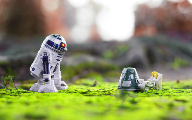 Toy robot grass building blurry free wallpaper - medium preview image