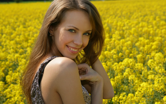 Woman field yellowflowers smiling autumn free wallpaper - medium preview image
