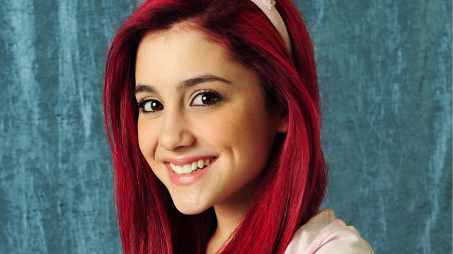 Woman red hair bow smiling free wallpaper - medium preview image