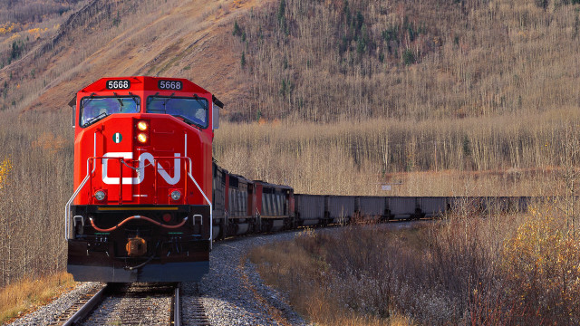 Red train forest hillside tiltshift free wallpaper - medium preview image