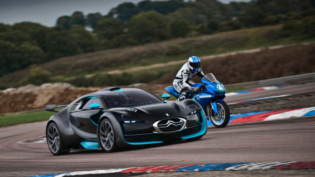 Motorcycle race track futuristic blurry free wallpaper - medium preview image