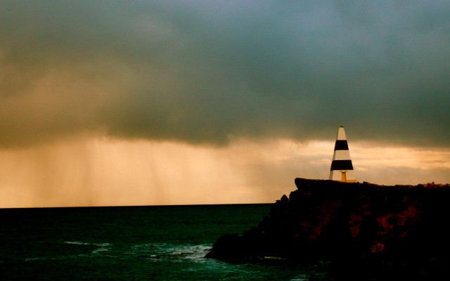 Lighthouse cliff stormy sky lightning free wallpaper - medium preview image