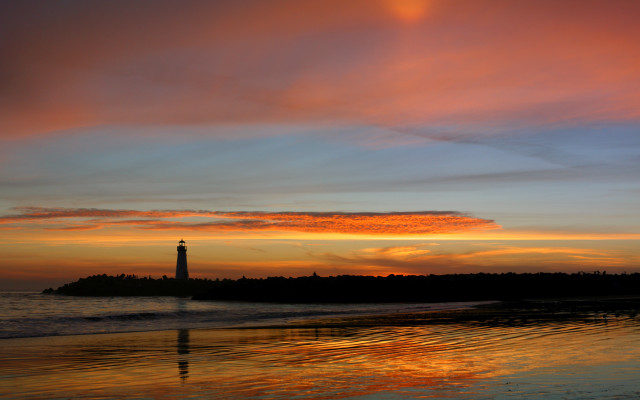 Lighthouse sunset ocean island portrait free wallpaper - medium preview image