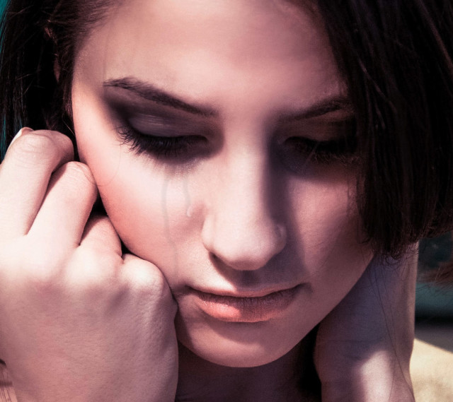 Woman hand face looking down free wallpaper - medium preview image