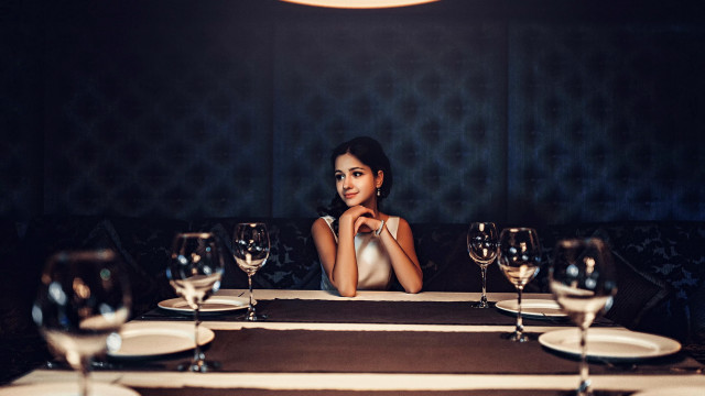 Woman sitting wine glasses portrait free wallpaper - medium preview image