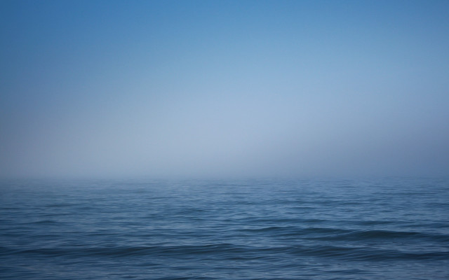 Foggy ocean with boat australian free wallpaper - medium preview image