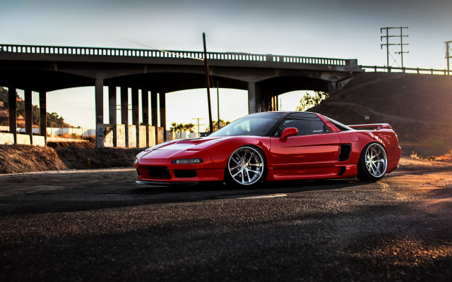 Red sports car bridge sunlight free wallpaper - medium preview image