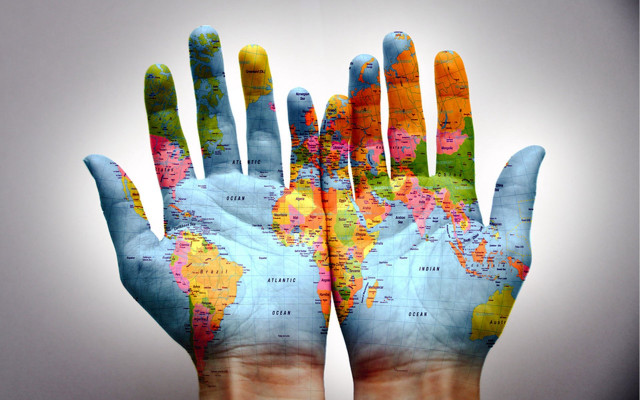 Hands world map ecological puzzle free wallpaper - medium preview image