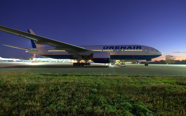 Large airplane runway night photorealism free wallpaper - medium preview image
