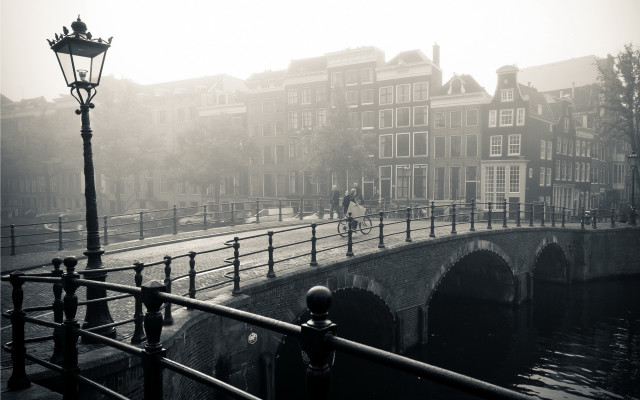City bridge biker oldbuildings lamppost free wallpaper - medium preview image