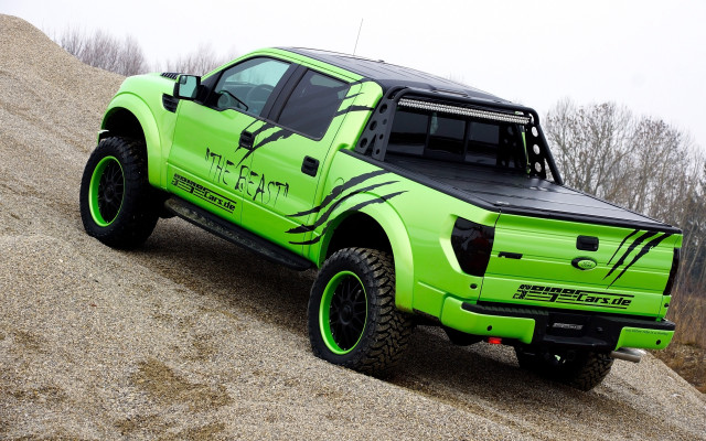 Green truck hill trees sky free wallpaper - medium preview image