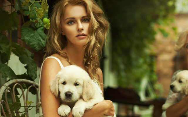 Woman puppy outside blurry animals free wallpaper - medium preview image