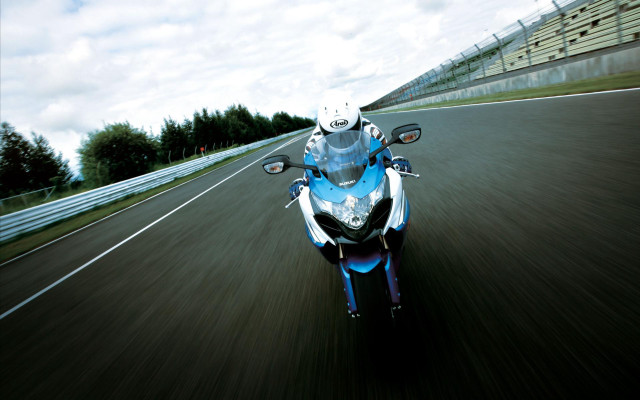 Motorcycle rider road clouds futurism free wallpaper - medium preview image