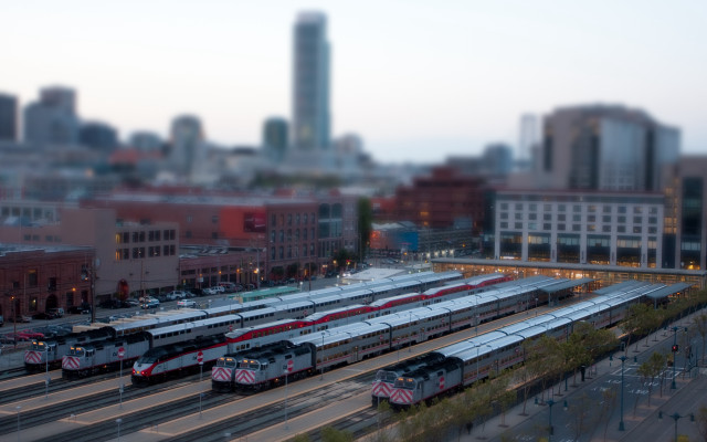 Train yard cityscape tiltshift blurry free wallpaper - medium preview image