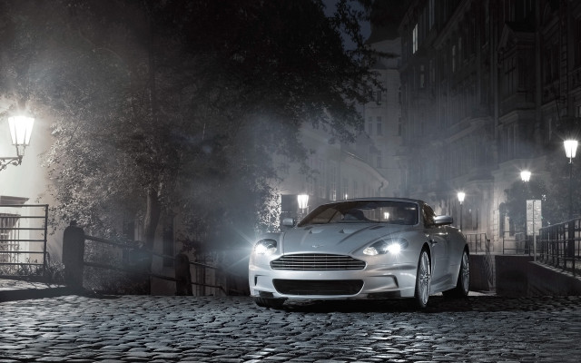 White car cobblestone night street free wallpaper - medium preview image