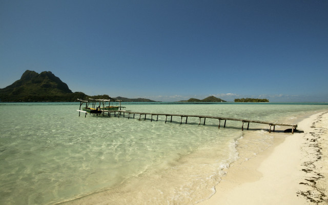 Pier ocean beach mountain scenery free wallpaper - medium preview image