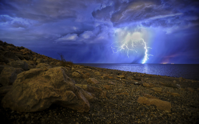 Lightning bolt ocean rocks cloudy free wallpaper - medium preview image