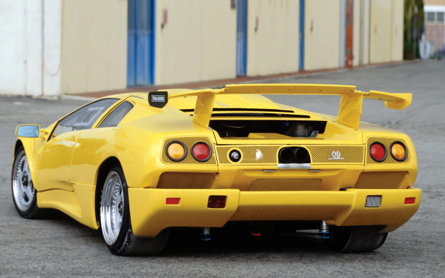 Yellow sports car parking lot #9 free wallpaper - medium preview image
