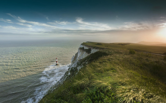 Cliff overlook sunset lighthouse beach free wallpaper - medium preview image