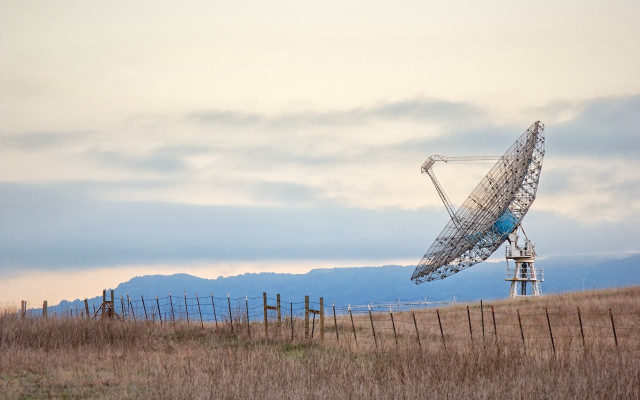 Satellite dish mountain field fence free wallpaper - medium preview image