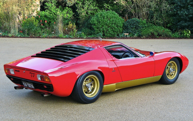 Red gold sports car forest free wallpaper - medium preview image