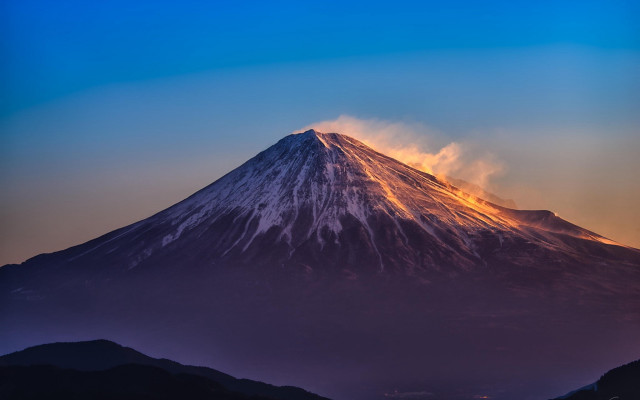Mountain smoke clouds sunset blue free wallpaper - medium preview image