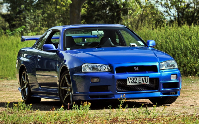 Blue car field forest sky free wallpaper - medium preview image