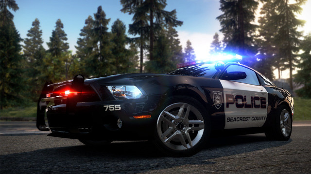 Police car parked trees forest free wallpaper - medium preview image