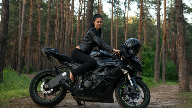 Woman motorcycle woods helmet black free wallpaper - medium preview image