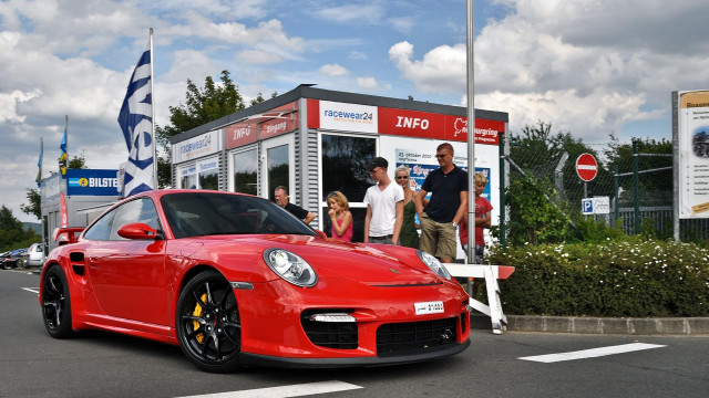 Red sports car booth people free wallpaper - medium preview image