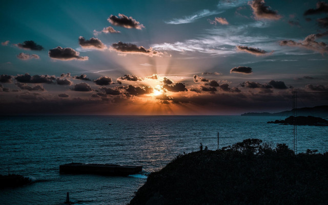 Sunset ocean clouds boat hill free wallpaper - medium preview image