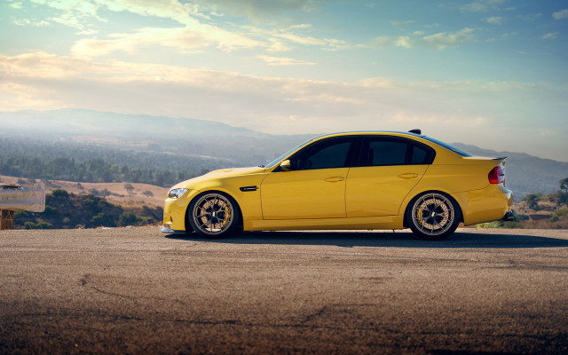 Yellow car mountain road sky free wallpaper - medium preview image