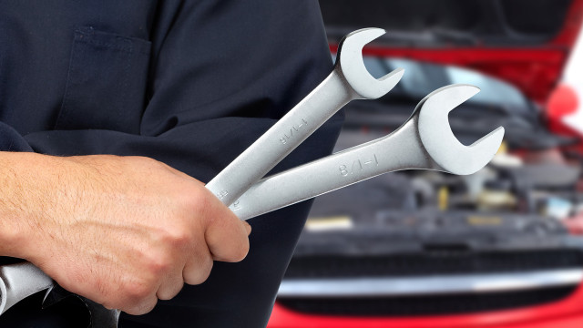 Man holding wrenches car engine free wallpaper - medium preview image