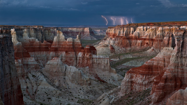 Cliff rocks lightning sky dramatic free wallpaper - medium preview image