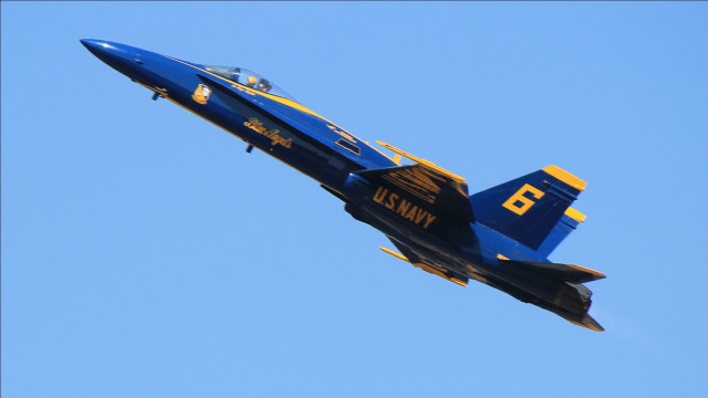 Blue yellow jet sky puzzle free wallpaper - medium preview image