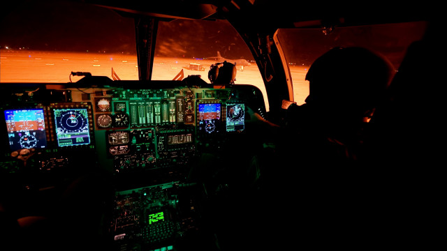 Man cockpit screens atmospheric lighting free wallpaper - medium preview image