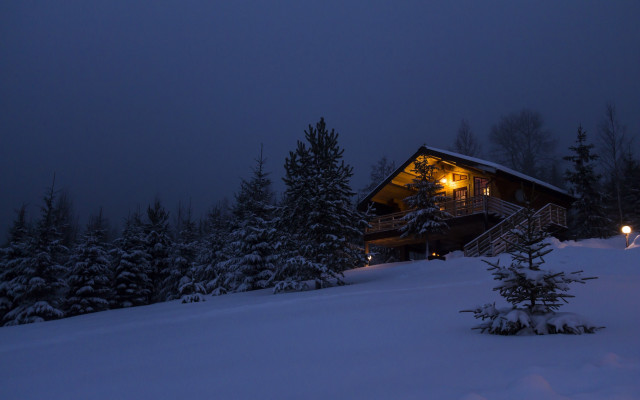 Cabin snow lit porch night free wallpaper - medium preview image