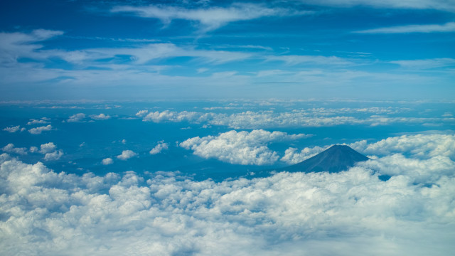 Mountain clouds blue sky beach free wallpaper - medium preview image