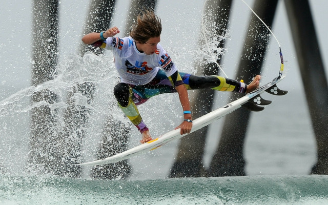 Surfing woman wave pier space free wallpaper - medium preview image