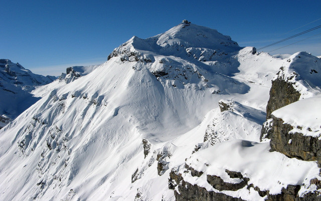 Snowy mountain ski lift blue free wallpaper - medium preview image