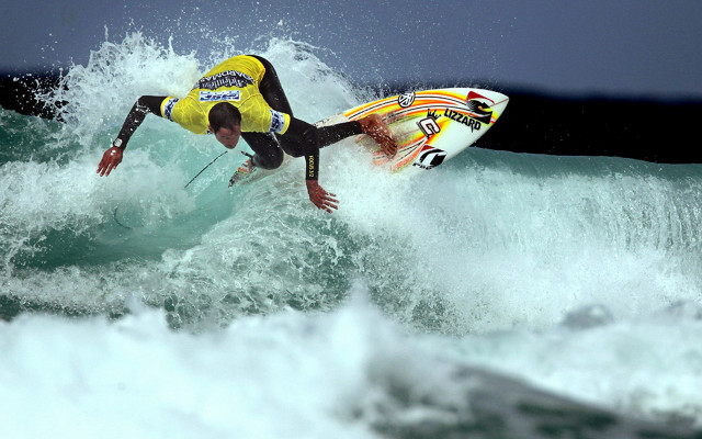 Man riding wave ocean surfboard free wallpaper - medium preview image