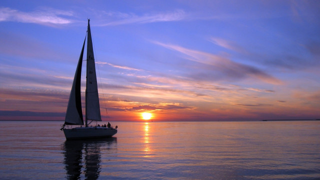 Sailboat ocean sunset dusk beach free wallpaper - medium preview image