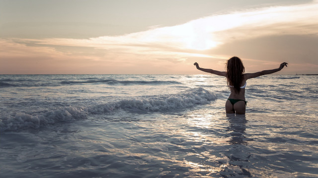 Woman bikini ocean arms outstretched free wallpaper - medium preview image