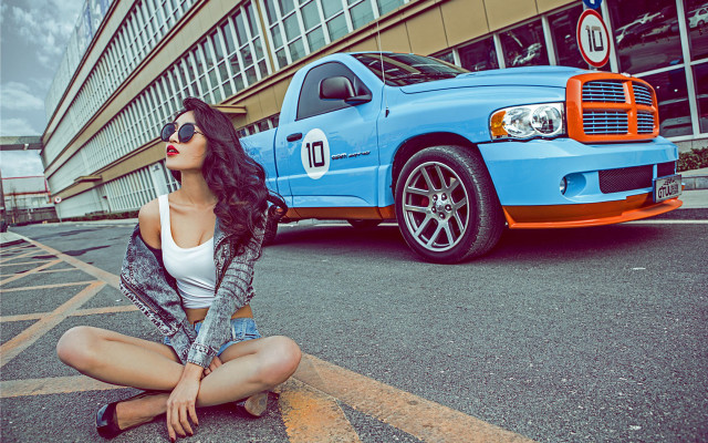 Woman blue truck parking lot free wallpaper - medium preview image