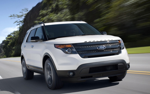 White suv driving forest hill free wallpaper - medium preview image