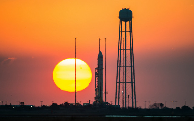 Sunset tower rocket orange sky free wallpaper - medium preview image