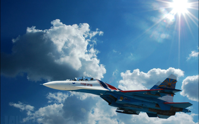 Jet blue sky clouds sun free wallpaper - medium preview image
