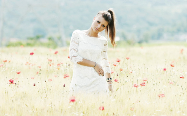 Woman flower field pony tail free wallpaper - medium preview image