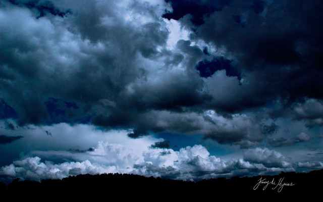 Cloudy sky hill stormy beach free wallpaper - medium preview image